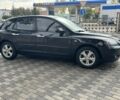 Черный Мазда 3, объемом двигателя 1.6 л и пробегом 215 тыс. км за 5850 $, фото 1 на Automoto.ua