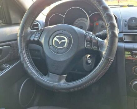 Черный Мазда 3, объемом двигателя 2 л и пробегом 198 тыс. км за 6200 $, фото 3 на Automoto.ua