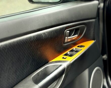 Черный Мазда 3, объемом двигателя 2 л и пробегом 275 тыс. км за 4200 $, фото 6 на Automoto.ua