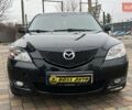 Черный Мазда 3, объемом двигателя 1.6 л и пробегом 265 тыс. км за 5999 $, фото 1 на Automoto.ua