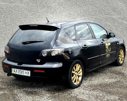 Черный Мазда 3, объемом двигателя 2 л и пробегом 275 тыс. км за 4200 $, фото 4 на Automoto.ua