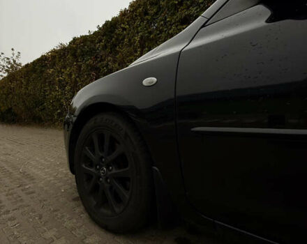 Черный Мазда 3, объемом двигателя 2 л и пробегом 274 тыс. км за 6800 $, фото 32 на Automoto.ua