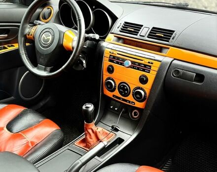 Черный Мазда 3, объемом двигателя 2 л и пробегом 275 тыс. км за 4200 $, фото 3 на Automoto.ua