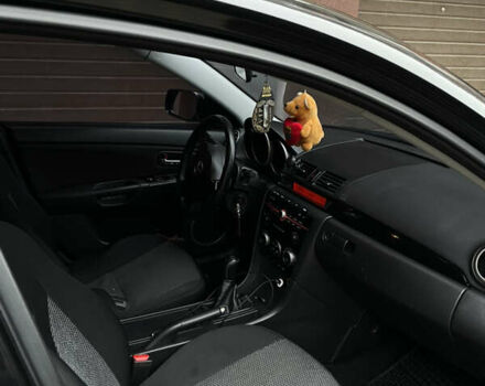 Черный Мазда 3, объемом двигателя 1.6 л и пробегом 210 тыс. км за 5200 $, фото 12 на Automoto.ua