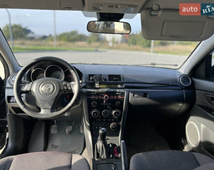 Чорний Мазда 3, об'ємом двигуна 2 л та пробігом 288 тис. км за 5500 $, фото 5 на Automoto.ua