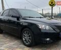 Черный Мазда 3, объемом двигателя 1.6 л и пробегом 265 тыс. км за 5999 $, фото 1 на Automoto.ua