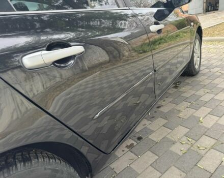 Черный Мазда 3, объемом двигателя 1.6 л и пробегом 215 тыс. км за 5850 $, фото 3 на Automoto.ua