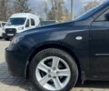 Чорний Мазда 3, об'ємом двигуна 1.6 л та пробігом 158 тис. км за 5999 $, фото 9 на Automoto.ua