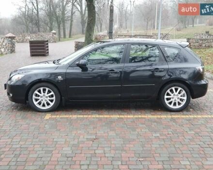 Черный Мазда 3, объемом двигателя 1.6 л и пробегом 264 тыс. км за 5700 $, фото 7 на Automoto.ua