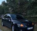 Черный Мазда 3, объемом двигателя 1.6 л и пробегом 248 тыс. км за 4900 $, фото 1 на Automoto.ua