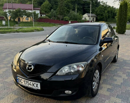 Черный Мазда 3, объемом двигателя 1.6 л и пробегом 240 тыс. км за 6200 $, фото 1 на Automoto.ua