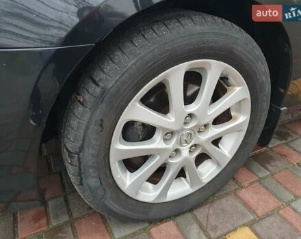 Черный Мазда 3, объемом двигателя 1.6 л и пробегом 264 тыс. км за 5700 $, фото 28 на Automoto.ua