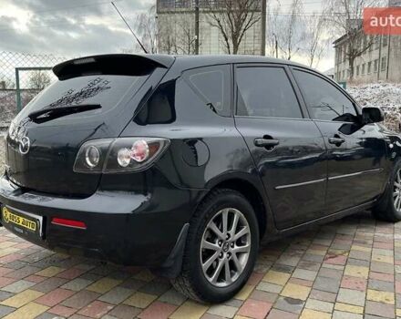 Черный Мазда 3, объемом двигателя 1.6 л и пробегом 265 тыс. км за 5999 $, фото 5 на Automoto.ua