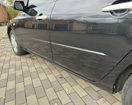 Черный Мазда 3, объемом двигателя 1.6 л и пробегом 215 тыс. км за 5850 $, фото 2 на Automoto.ua