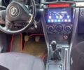 Черный Мазда 3, объемом двигателя 1.6 л и пробегом 300 тыс. км за 5200 $, фото 8 на Automoto.ua