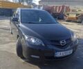 Черный Мазда 3, объемом двигателя 2 л и пробегом 160 тыс. км за 5800 $, фото 1 на Automoto.ua