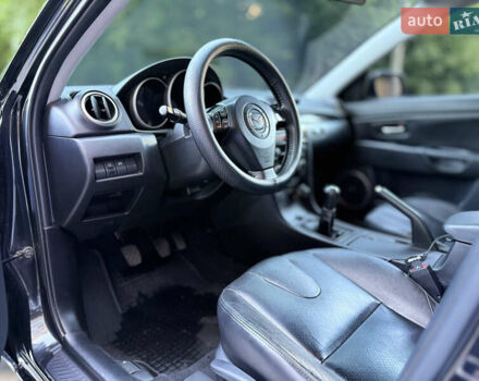 Черный Мазда 3, объемом двигателя 1.6 л и пробегом 205 тыс. км за 6400 $, фото 14 на Automoto.ua