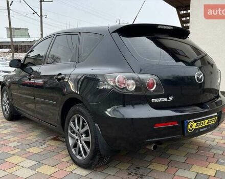 Черный Мазда 3, объемом двигателя 1.6 л и пробегом 265 тыс. км за 5999 $, фото 3 на Automoto.ua
