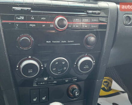 Черный Мазда 3, объемом двигателя 1.6 л и пробегом 265 тыс. км за 5999 $, фото 16 на Automoto.ua