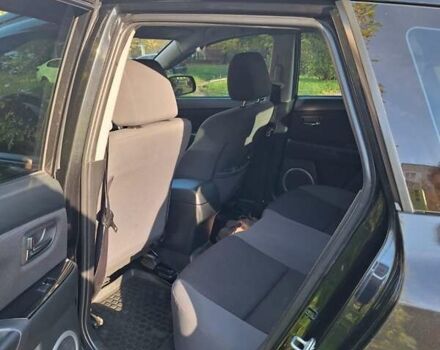 Черный Мазда 3, объемом двигателя 2 л и пробегом 198 тыс. км за 6200 $, фото 9 на Automoto.ua