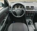 Чорний Мазда 3, об'ємом двигуна 1.6 л та пробігом 264 тис. км за 5700 $, фото 9 на Automoto.ua