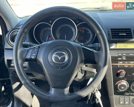 Черный Мазда 3, объемом двигателя 1.6 л и пробегом 107 тыс. км за 7400 $, фото 47 на Automoto.ua