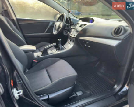 Черный Мазда 3, объемом двигателя 1.6 л и пробегом 127 тыс. км за 7500 $, фото 30 на Automoto.ua