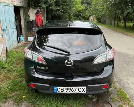 Черный Мазда 3, объемом двигателя 1.6 л и пробегом 244 тыс. км за 6500 $, фото 1 на Automoto.ua