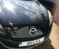Черный Мазда 3, объемом двигателя 1.6 л и пробегом 300 тыс. км за 5600 $, фото 1 на Automoto.ua