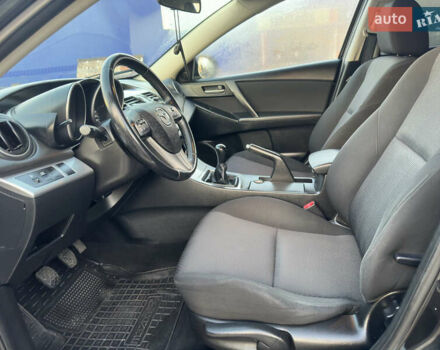 Черный Мазда 3, объемом двигателя 1.6 л и пробегом 127 тыс. км за 7500 $, фото 42 на Automoto.ua