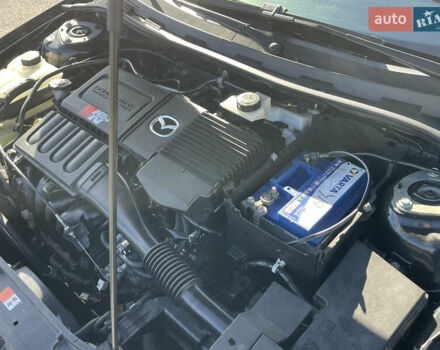 Черный Мазда 3, объемом двигателя 1.6 л и пробегом 107 тыс. км за 7400 $, фото 58 на Automoto.ua