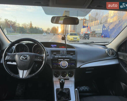 Черный Мазда 3, объемом двигателя 1.6 л и пробегом 127 тыс. км за 7500 $, фото 45 на Automoto.ua