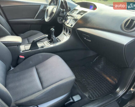 Черный Мазда 3, объемом двигателя 1.6 л и пробегом 127 тыс. км за 7500 $, фото 28 на Automoto.ua