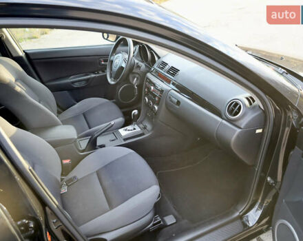 Черный Мазда 3, объемом двигателя 1.6 л и пробегом 183 тыс. км за 7499 $, фото 25 на Automoto.ua