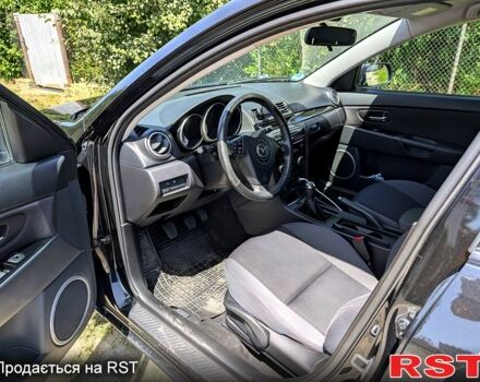 Черный Мазда 3, объемом двигателя 1.6 л и пробегом 217 тыс. км за 4800 $, фото 4 на Automoto.ua