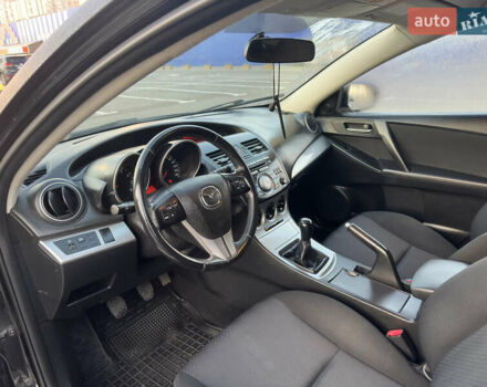 Черный Мазда 3, объемом двигателя 1.6 л и пробегом 127 тыс. км за 7500 $, фото 43 на Automoto.ua