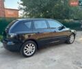 Чорний Мазда 3, об'ємом двигуна 1.6 л та пробігом 194 тис. км за 7350 $, фото 6 на Automoto.ua