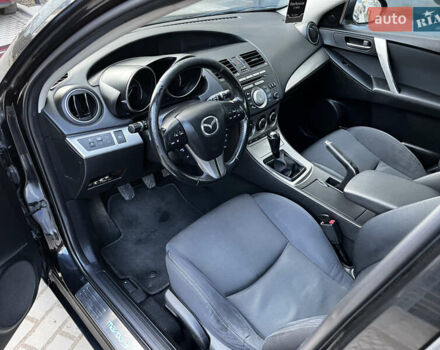Черный Мазда 3, объемом двигателя 1.6 л и пробегом 235 тыс. км за 5799 $, фото 16 на Automoto.ua