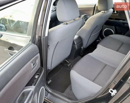 Черный Мазда 3, объемом двигателя 1.6 л и пробегом 183 тыс. км за 7499 $, фото 21 на Automoto.ua