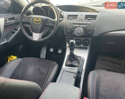 Черный Мазда 3, объемом двигателя 2.3 л и пробегом 194 тыс. км за 11900 $, фото 8 на Automoto.ua