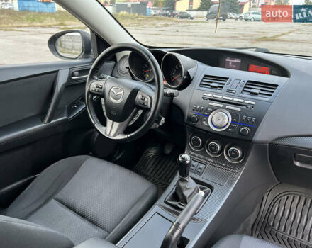 Черный Мазда 3, объемом двигателя 1.6 л и пробегом 205 тыс. км за 7499 $, фото 16 на Automoto.ua