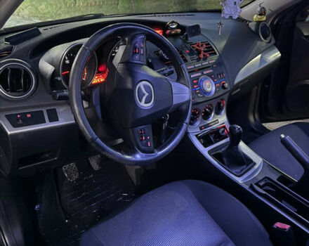 Черный Мазда 3, объемом двигателя 1.56 л и пробегом 243 тыс. км за 6300 $, фото 6 на Automoto.ua