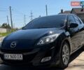 Черный Мазда 3, объемом двигателя 2 л и пробегом 193 тыс. км за 7850 $, фото 1 на Automoto.ua