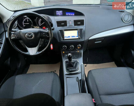Черный Мазда 3, объемом двигателя 1.6 л и пробегом 145 тыс. км за 7799 $, фото 14 на Automoto.ua