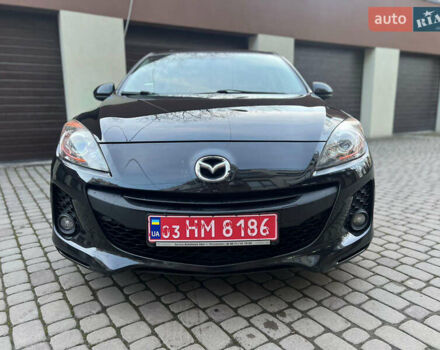 Черный Мазда 3, объемом двигателя 1.6 л и пробегом 145 тыс. км за 7799 $, фото 11 на Automoto.ua