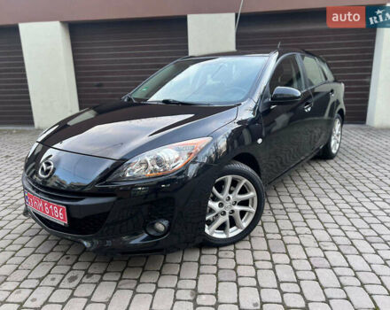 Черный Мазда 3, объемом двигателя 1.6 л и пробегом 145 тыс. км за 7799 $, фото 1 на Automoto.ua