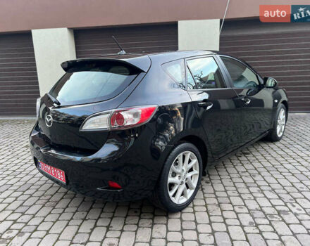 Черный Мазда 3, объемом двигателя 1.6 л и пробегом 145 тыс. км за 7799 $, фото 7 на Automoto.ua