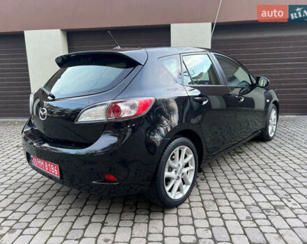 Чорний Мазда 3, об'ємом двигуна 1.6 л та пробігом 145 тис. км за 7599 $, фото 6 на Automoto.ua