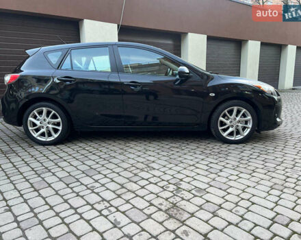 Чорний Мазда 3, об'ємом двигуна 1.6 л та пробігом 145 тис. км за 7599 $, фото 9 на Automoto.ua