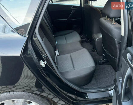Чорний Мазда 3, об'ємом двигуна 1.6 л та пробігом 145 тис. км за 7599 $, фото 18 на Automoto.ua